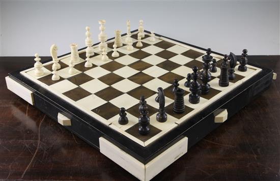A Continental turned ivory and horn chess set, c.1920-30, 19in.